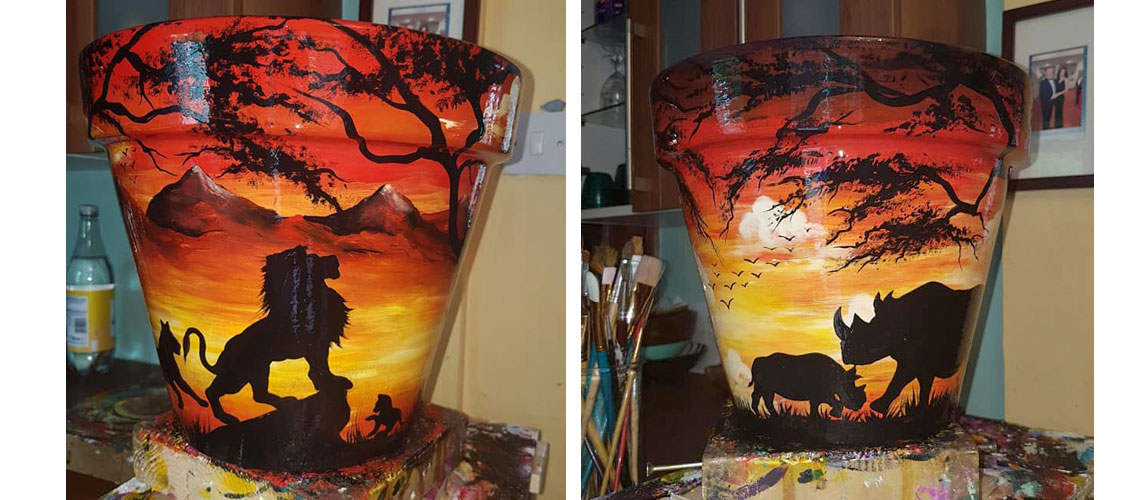 Hand painted flower pots with African animals and scenes