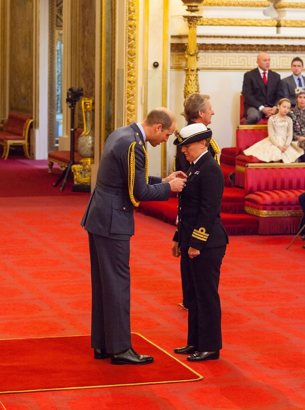 Being awarded the OBE by the Duke of Cambridge