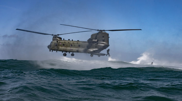 Royal Marines leapt ten feet from Chinook helicopters into the Bristol Channel