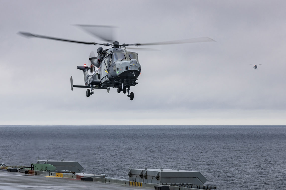 HMS Queen Elizabeth and her embarked jets and helicopters
