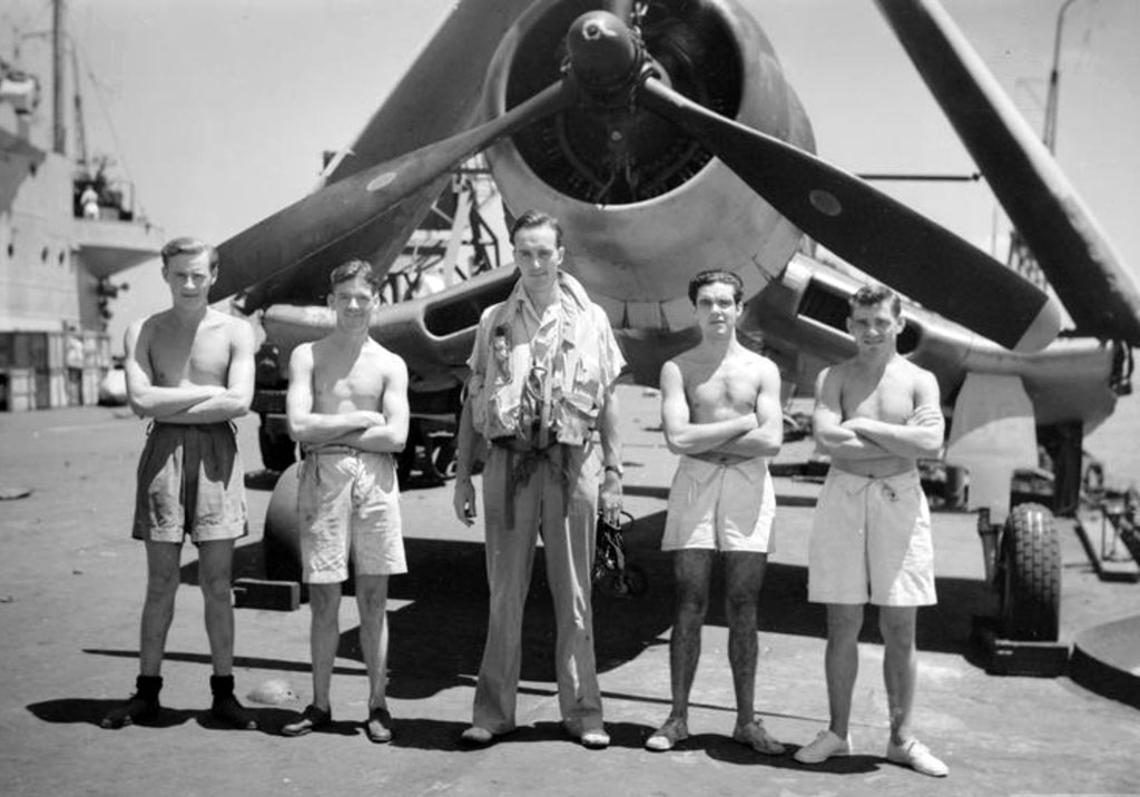 Air and ground crew of 1833 NAS in front of a Corsair aboard HMS Illustrious