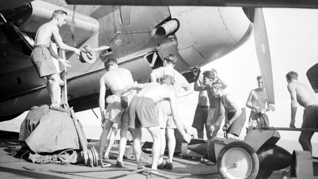 An Avenger is bombed up aboard HMS Illustrious